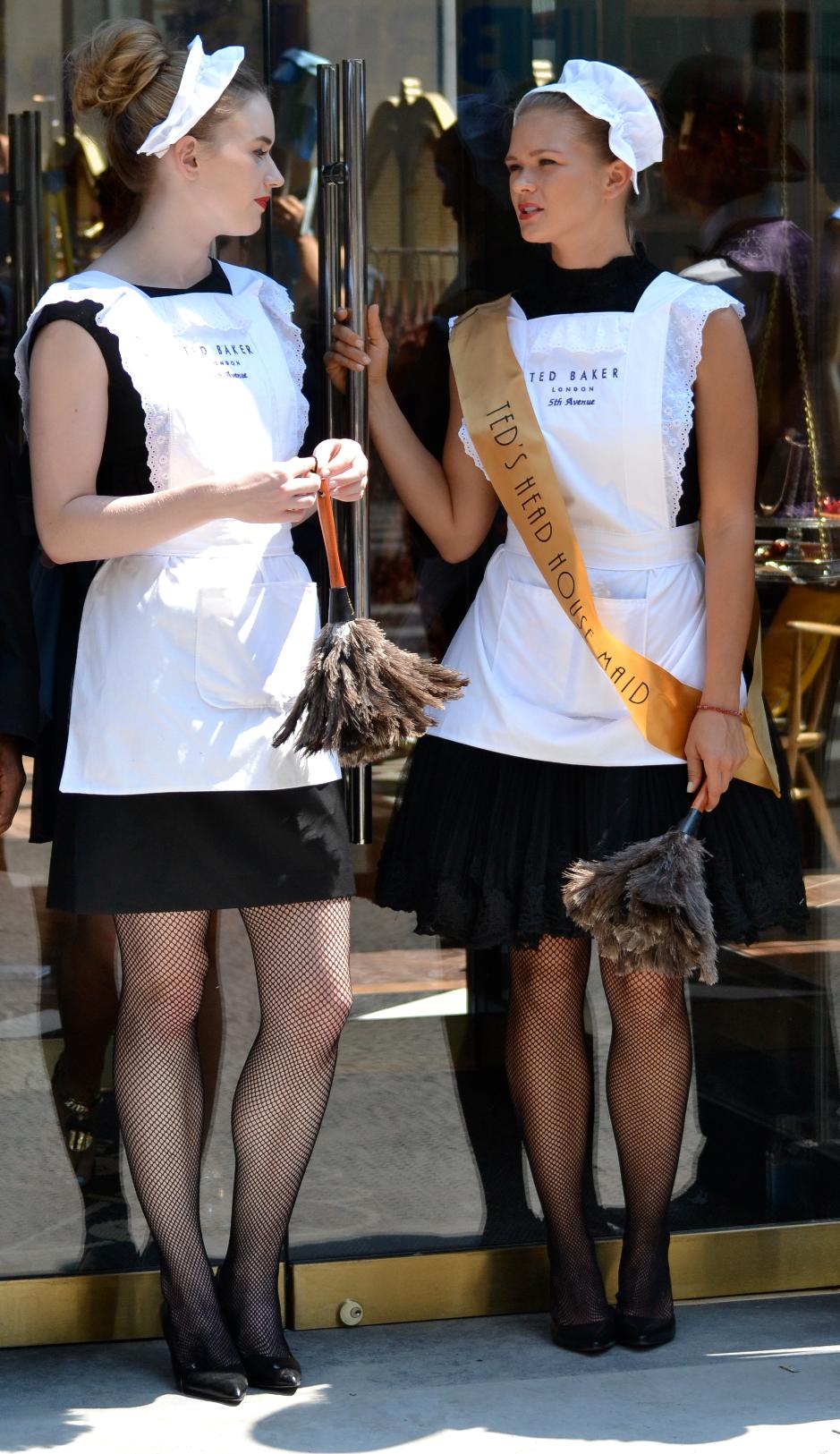 Two French Maids wearing Black Fishnet Pantyhose and White Aprons